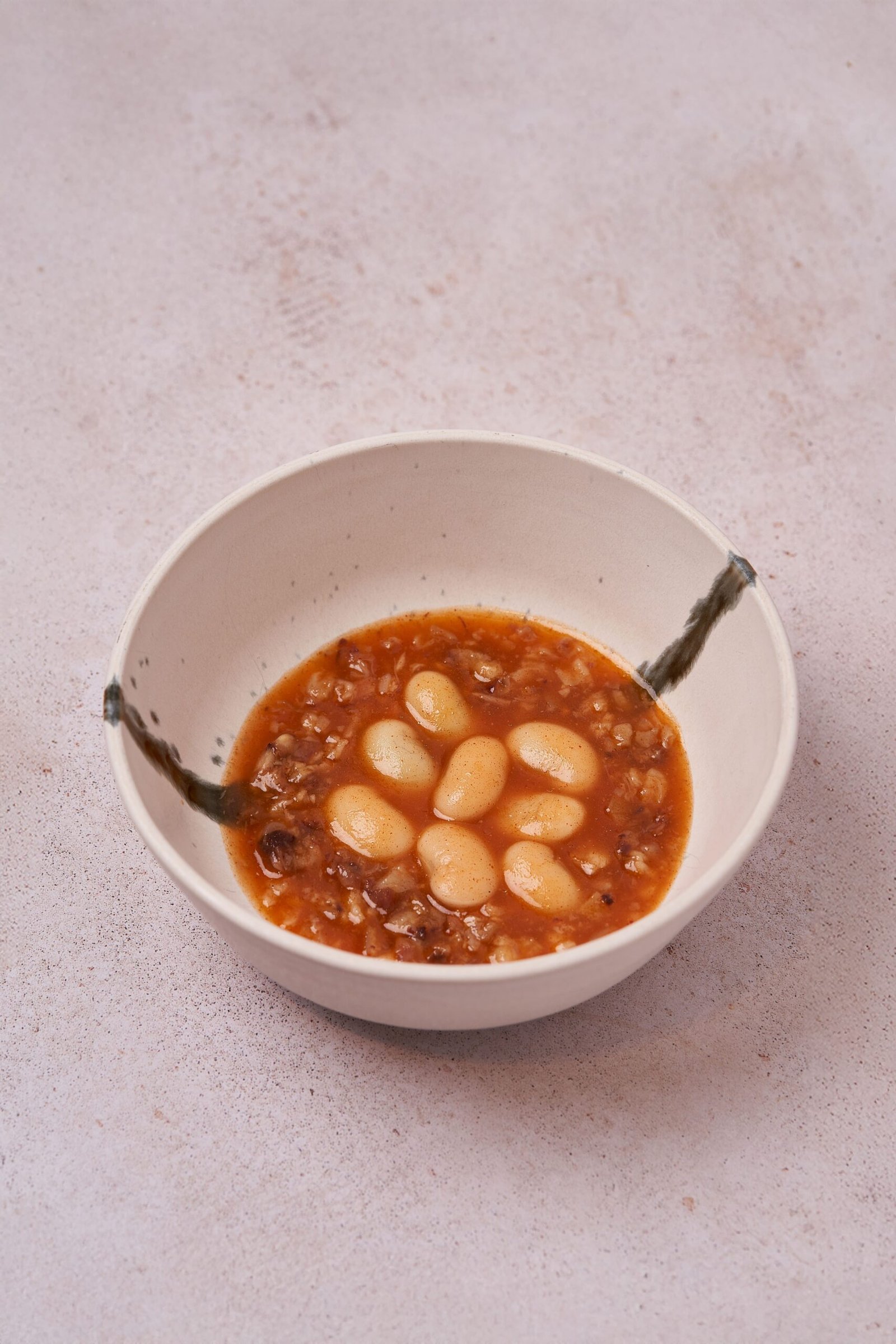 lentellón de banzas con guiso de manitas de cerdo